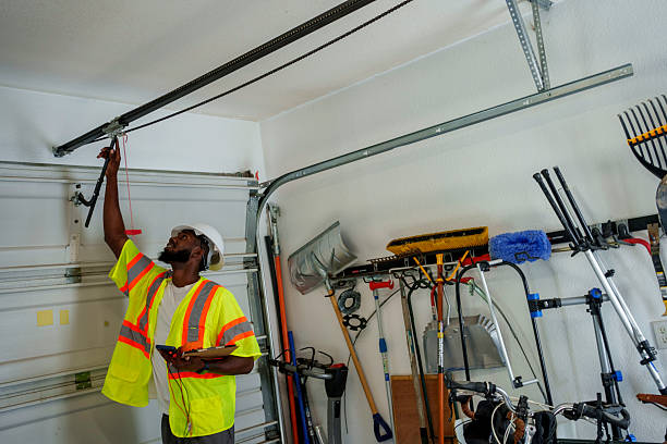 Professional Garage Door Panel Replacement technician working in Roslyn Estates, NY